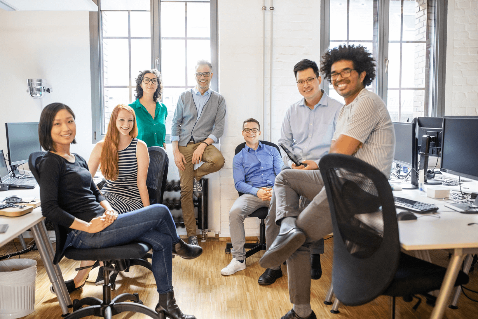 A diverse business team gathered in an office