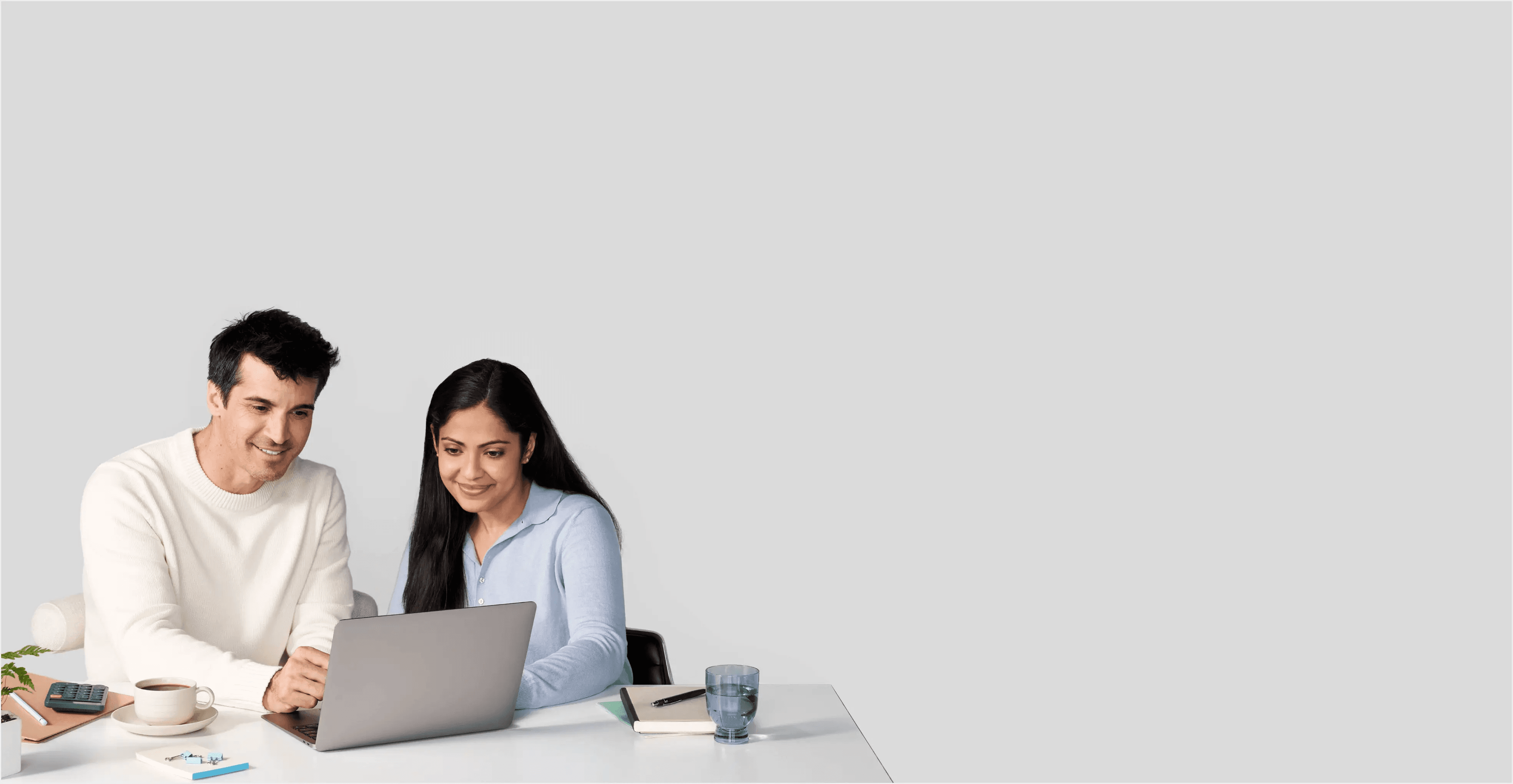 Two people completing an affiliate application