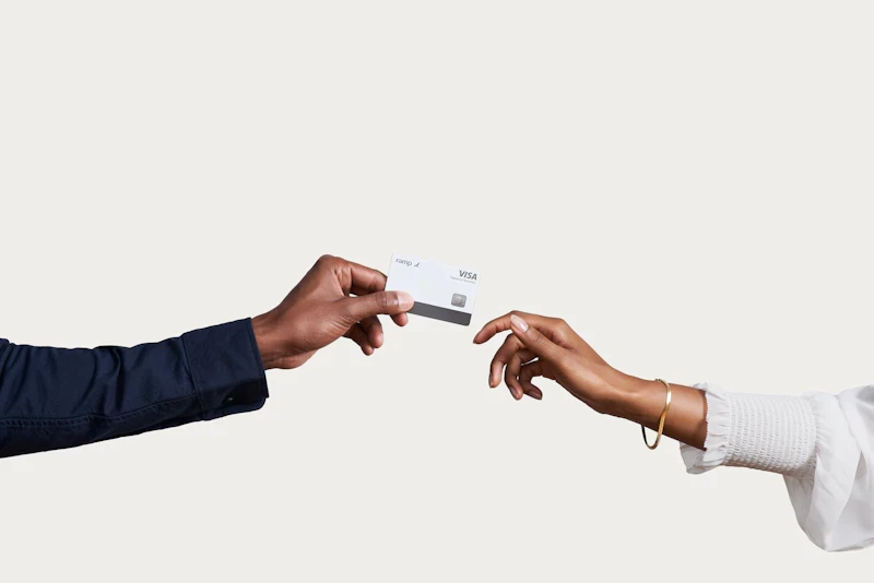 A payment card being handed to a customer